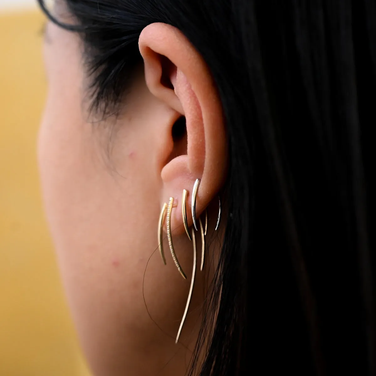 Gold Infinite Tusk Earrings