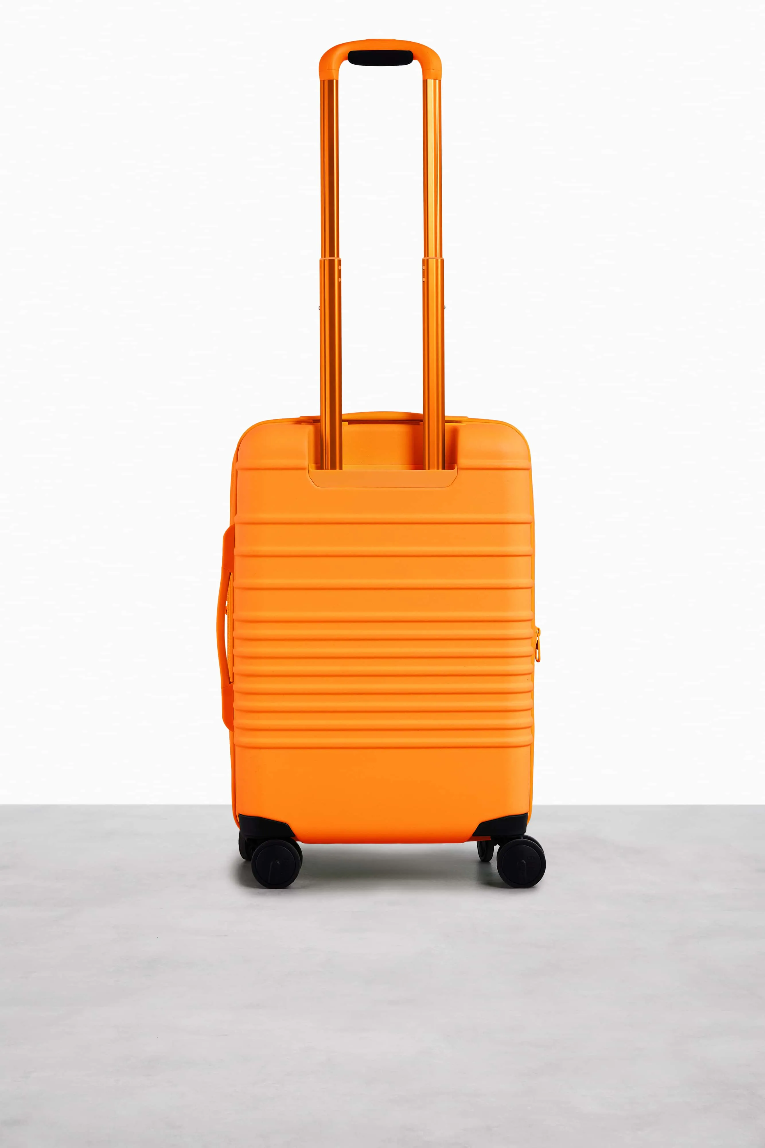 The Carry-On Roller in Creamsicle