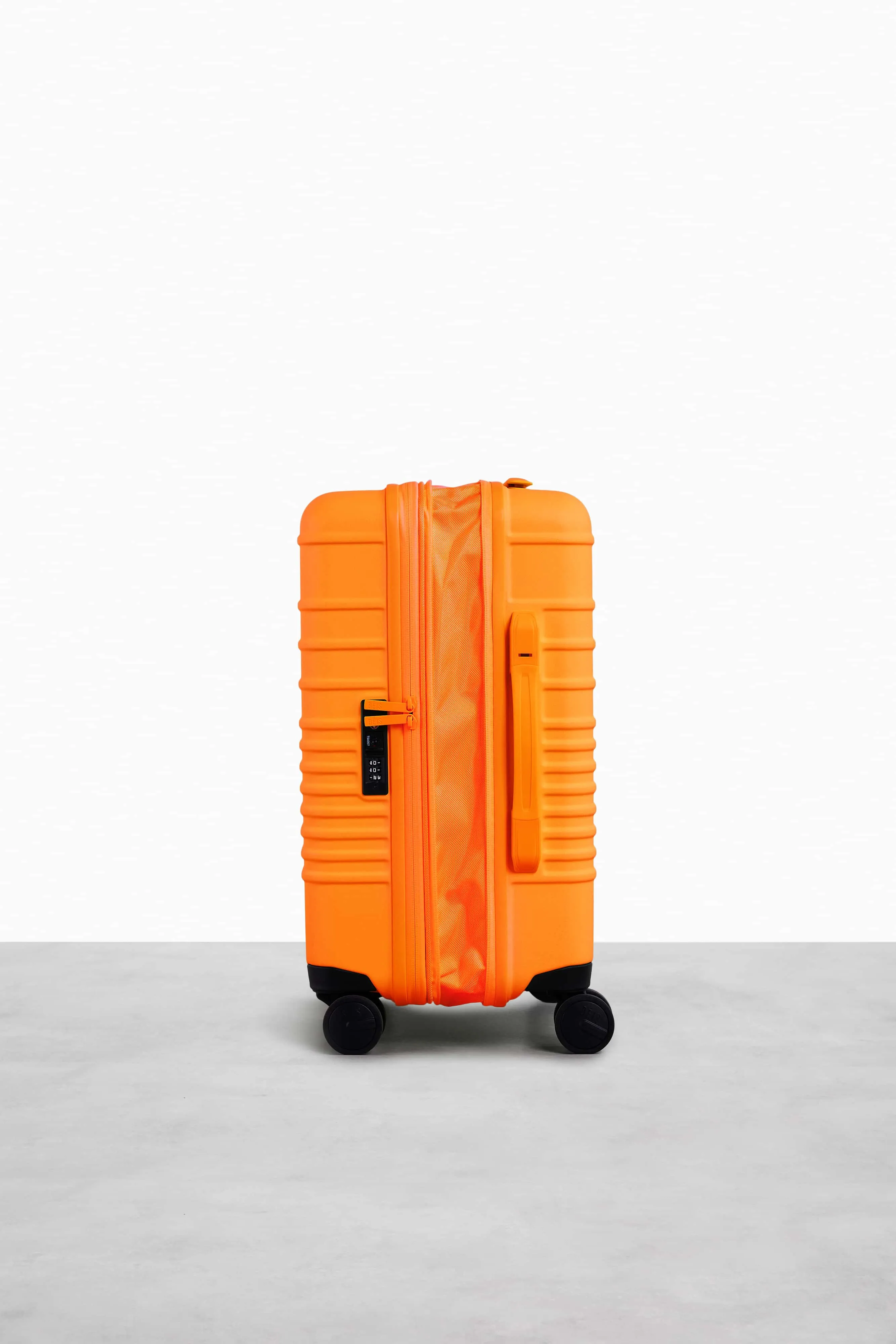 The Carry-On Roller in Creamsicle